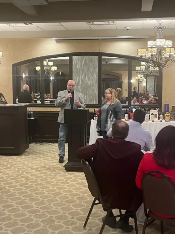 Dawn and Dano speaking at an event