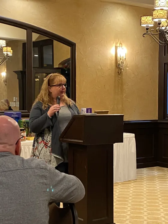 Dawn speaking at an event
